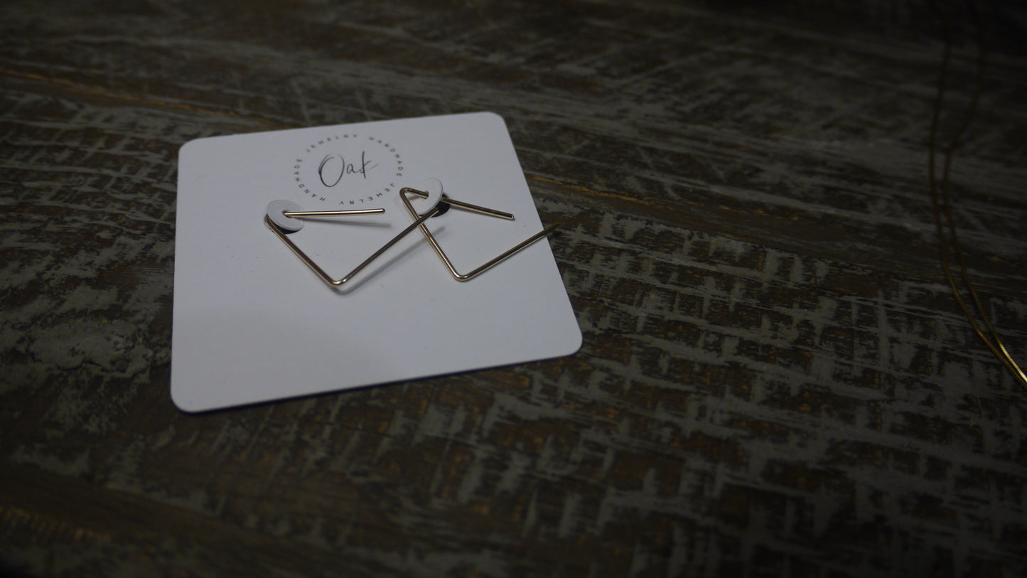 Triangular gold earrings